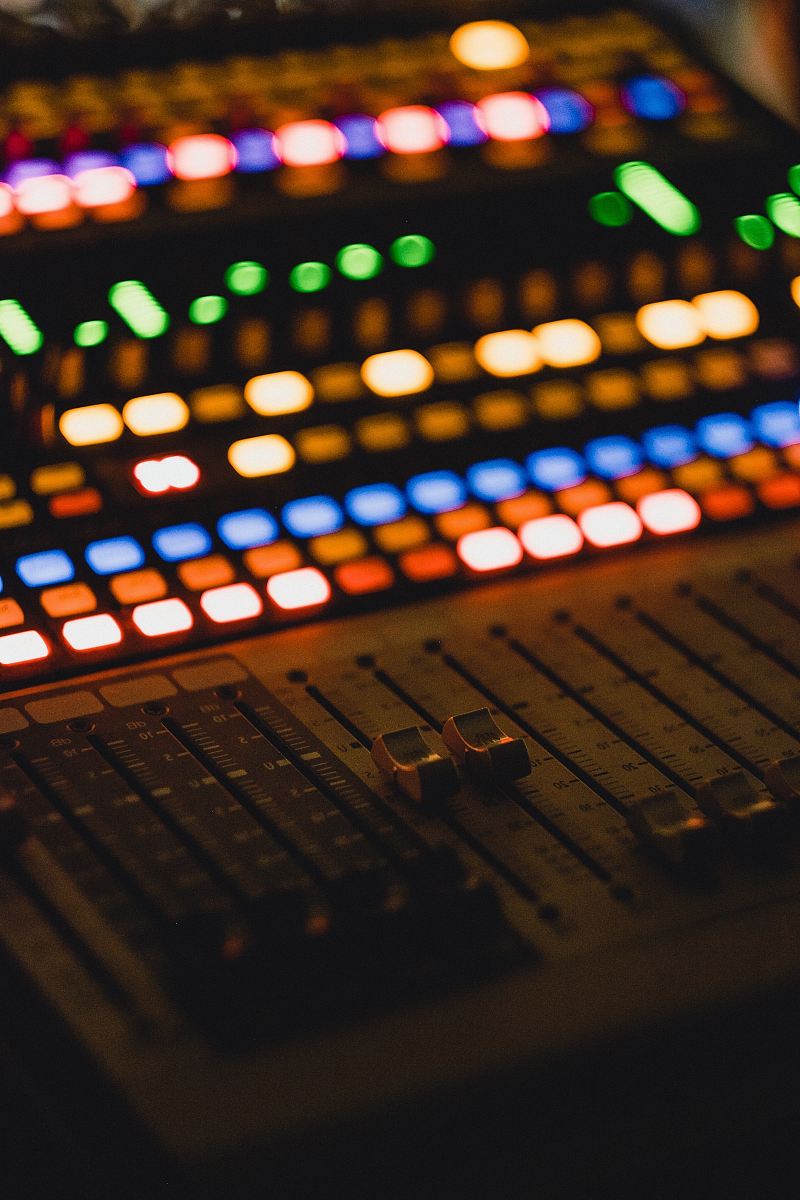 shallow focus photography of audio mixer